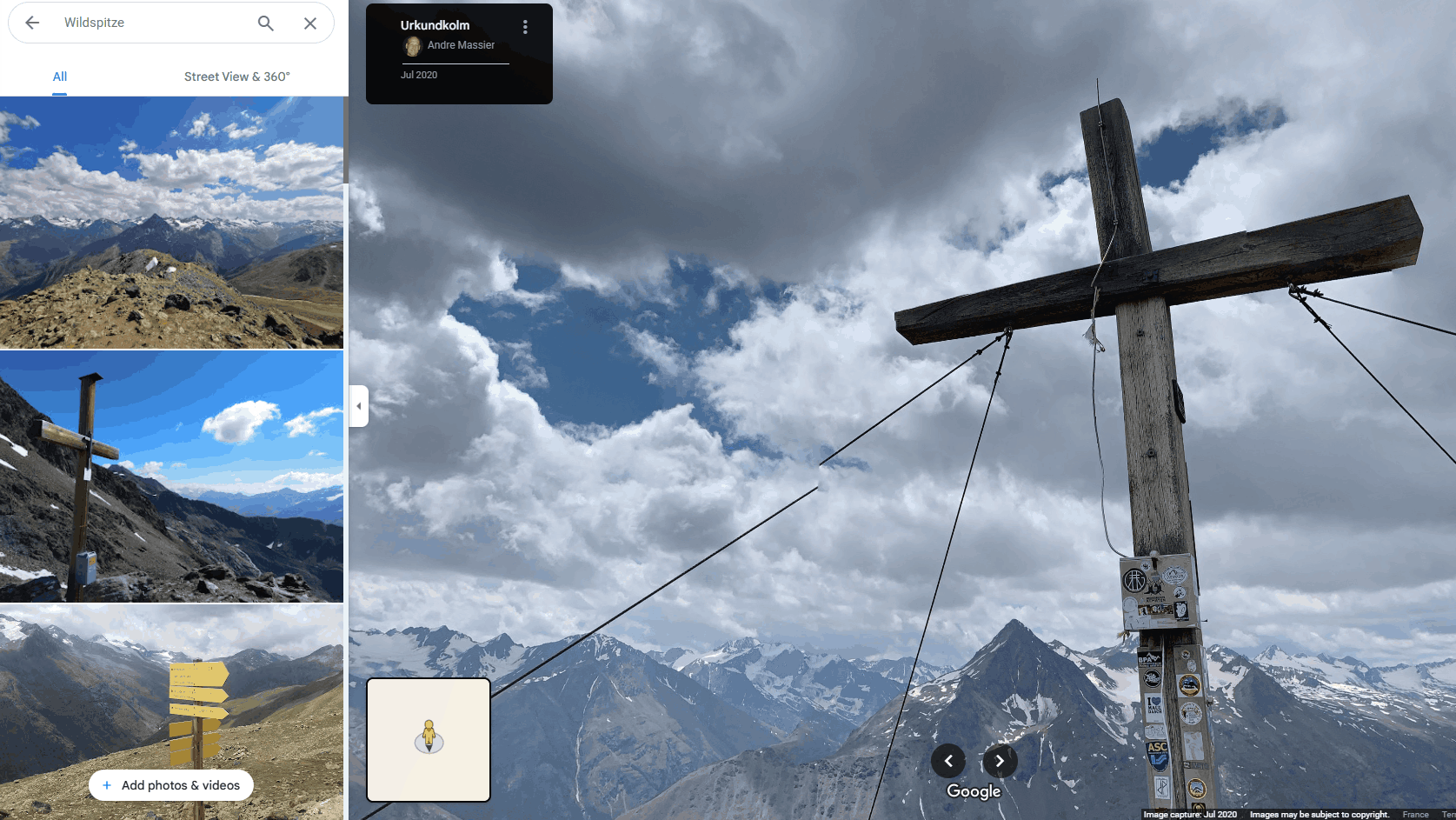 a screenshot of Google Maps showing a summit cross on top of a mountain