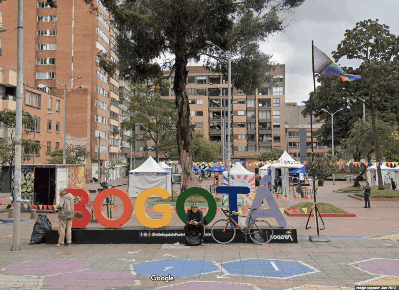 Google street view screenshot showing a Pride flag next to a rainbow-colored “Bogotá”